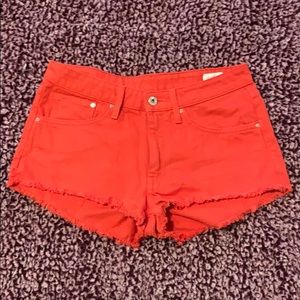 Orange denim shorts